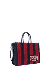 Tote torba z rdečimi in mornarskimi črtami na tekstilni zunanjosti, mehkega otipa, s črnimi usnjenimi ročaji in oznako "JOOP! JEANS."