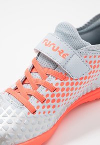 Puma Botines de fútbol para césped - light blue