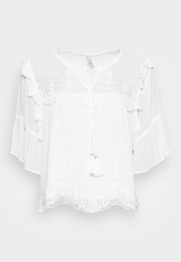 Blusa leggera bianca con delicate ricamature, maniche arricciate, scollatura rotonda e nastri regolabili con frange sul davanti.