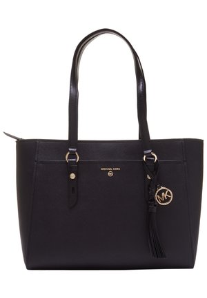 Sac cabas noir Michael Kors avec double poignée, plaque logo dorée et breloque pompon décorative à l'avant.