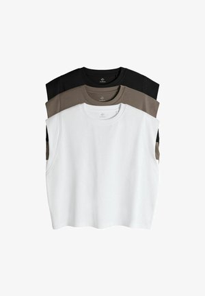 Kolm varrukateta ümmarguse kaelusega särkidest virnas: valge, oliivroheline ja must. Valmistatud pehmest kangast, millel on sile tekstuur ja tavapärane lõige.