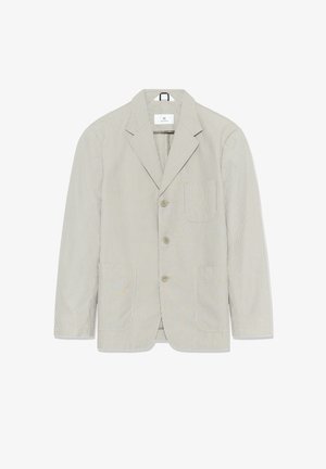 Blazer à rayures beige clair et blanc. Doté d'un col à revers, d'une fermeture à un bouton et de deux poches frontales. Tissu léger.
