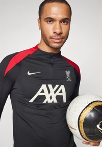 Nike Performance LIVERPOOL FC NIKE DF STRIKE DRILL TOP K - Klub merchandise - black/gym red/light orewood burn