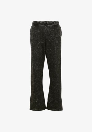 Schwarze, weit geschnittene Hosen mit texturiertem Finish, ausgestattet mit einem Bund und einem markanten, gemusterten Akzent an der Seite. Flacher Bund.
