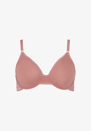Light pink seamless bra with adjustable straps, underwire support, and a smooth texture. Features classic design and decorative stitching details.