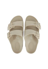 Beige Sandalen mit offenen Zehen, zwei verstellbaren Schnallenriemen und strukturierten Fußbetten, von oben gezeigt.