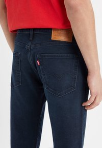 Levi's® Jeans Tapered Fit - dark-blue denim