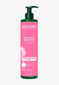 Crema corpo lenitiva Weleda con rosa selvatica e vitamina E in un flacone rosa da 250ml con pompa per una pelle morbida ed elastica.