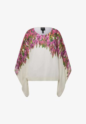 Witte poncho met een bloemenpatroon in roze en groene accenten. Ronde halslijn en een losse pasvorm met vloeiende mouwen. Lichtgewicht stof.
