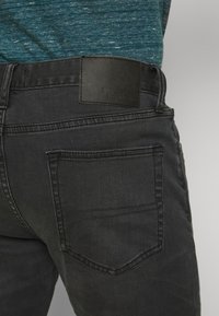 Superdry & Co Vaqueros slim fit - black denim