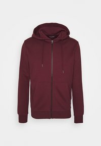 Burgundy zip-up hoodie i mjukt tyg, med dragsko i huvan, framfickor och ribbade ärmslut med en slät yta.