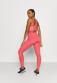 Nike Performance ONE - Leggings - archaeo pink/white