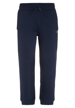 Granatowe spodnie dresowe Vans z elastycznym pasem i sznurkiem, ściągaczami oraz subtelnym logo Vans na górnej części uda.