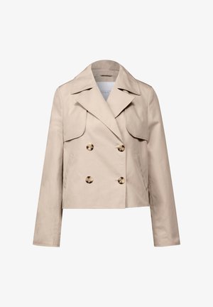 Beige sako s dvojitým zapínáním a klopovým límcem, dvěma předními kapsami a velkými kulatými knoflíky. Vyrobeno z hladké, lehké látky.