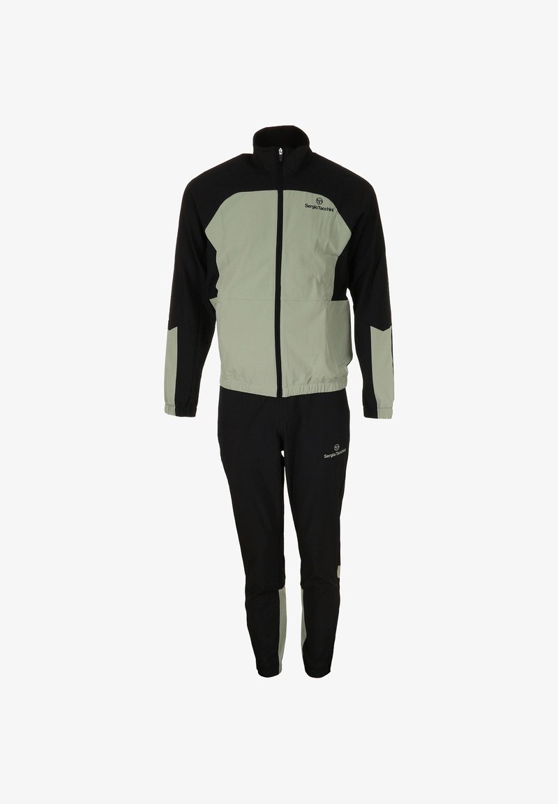 Tuta sportivo caratterizzato da una combinazione di colori nero e verde chiaro, realizzato in tessuto leggero con giacca con zip e pantaloni con vita elastica.