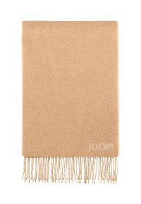 Beige Wollschal mit einer weichen Textur, mit fransenbesetzten Kanten. Hat ein dezentes "JOOP!"-Logo in heller Farbe in der unteren Ecke.