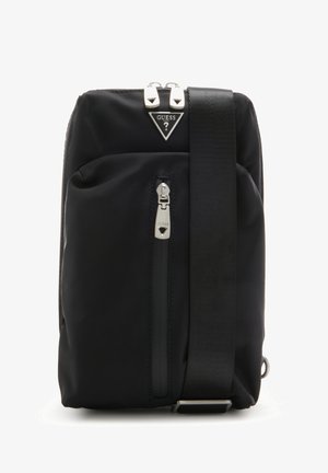 Borsa a spalla in nylon nero con due cerniere, una tracolla regolabile e un logo triangolare nella parte superiore. Texture liscia, design minimalista.