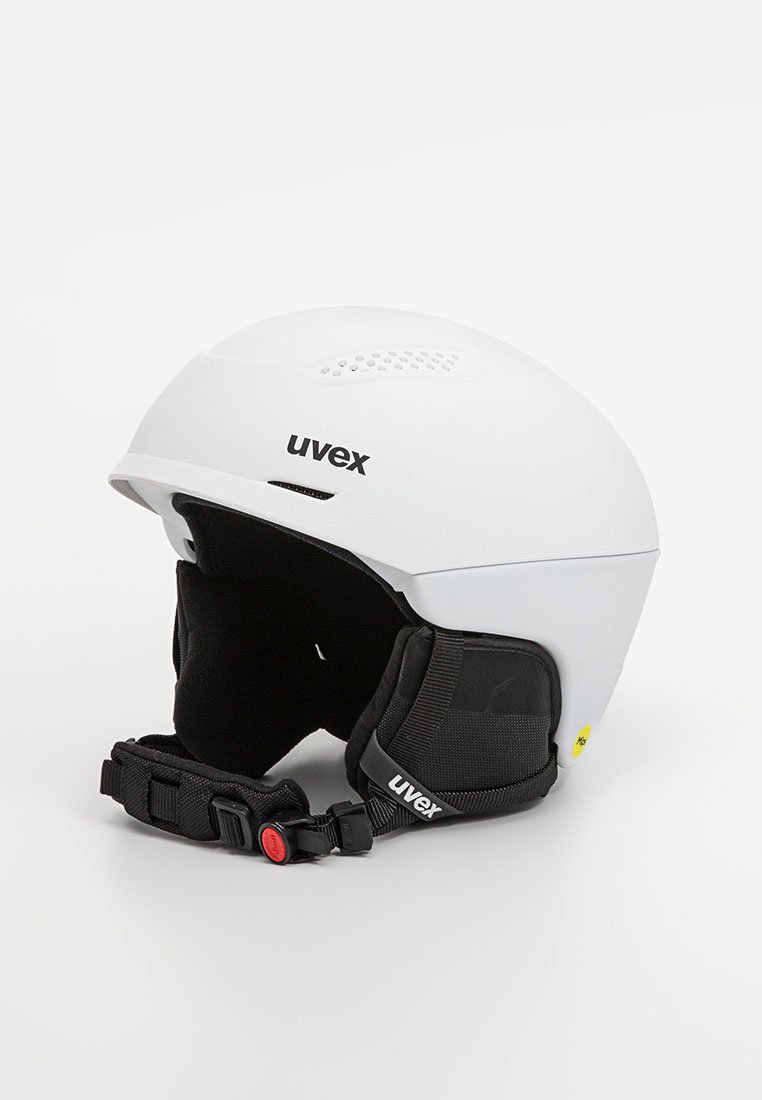 Weißer Skihelm mit Belüftungsöffnungen oben, schwarzem verstellbaren Kinnriemen und Branding. Mattes Finish mit gepolsterten Ohrenabdeckungen.