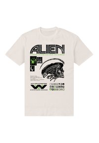 Camiseta blanca de algodón con texto "ALIEN" en negro y verde negrita, con gráfico de una criatura alienígena y varios íconos y textos debajo.