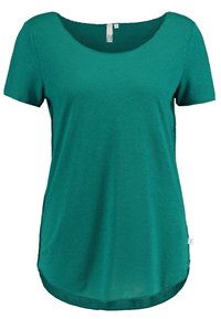 T-shirt a maniche corte color teal con scollatura arrotondata, texture morbida e spacchi laterali sull'orlo per una vestibilità rilassata. Finitura del tessuto liscia.