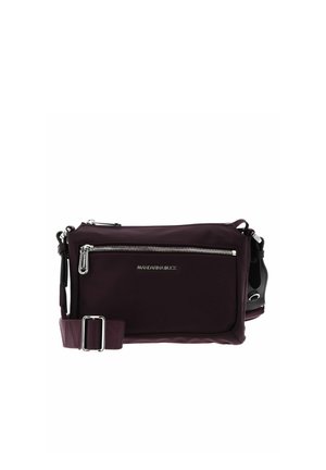 Sac bandoulière violet foncé avec poche avant zippée, détails en fermeture éclair argentés et bandoulière réglable, marqué du logo Mandarina Duck.