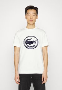 Lacoste T-shirt estampada - farine