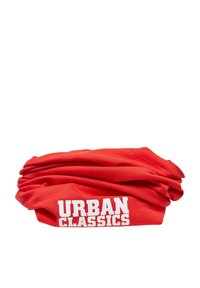 Raudonas ištempiamas galvos apdangalas su baltu užrašu "URBAN CLASSICS", pagamintas iš minkštos medžiagos, pasižymintis lygiu paviršiumi ir surinktu dizainu.