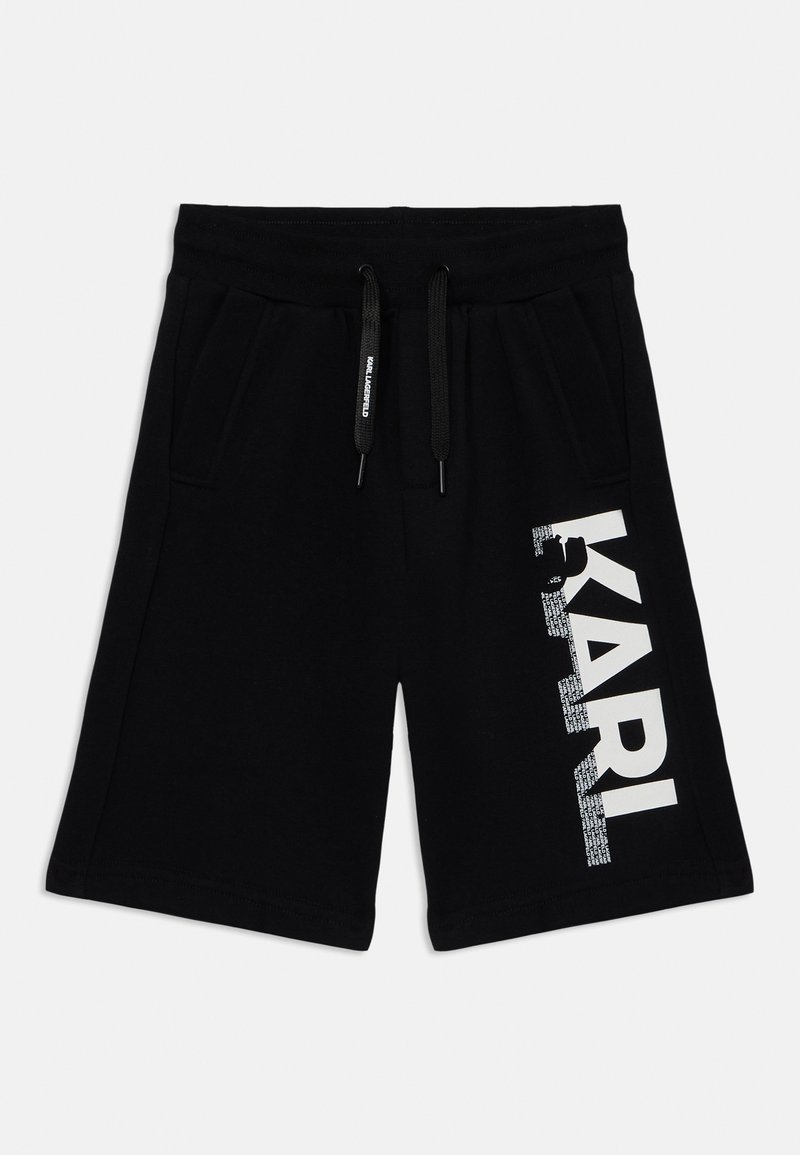 Zwarte katoenen shorts met een elastische tailleband, voorzien van een trekkoord en zijzakken. Het linkerbeen heeft een groot wit logo opdruk.