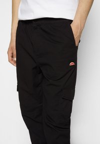 Ellesse INNES - Cargobukse - black