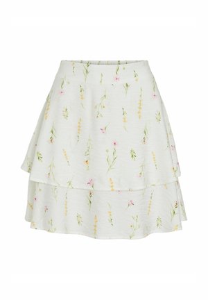 Jupe blanche à plusieurs couches avec un petit imprimé floral jaune, rose et vert, dotée d'une ceinture ajustée et d'une légère évasement.