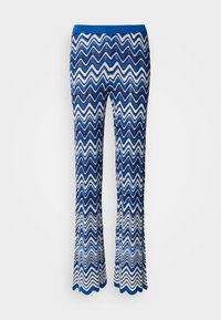 Blue and white zigzag patterned flared pants made of textured, lightweight fabric with a contrasting blue elastic waistband.