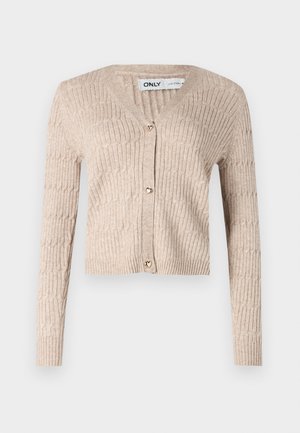Beige pletený kardigan s dlouhými rukávy, v-výstřihem a zlatými knoflíky ve tvaru srdce. Má žebrovanou strukturu a zkrácen�ý design.