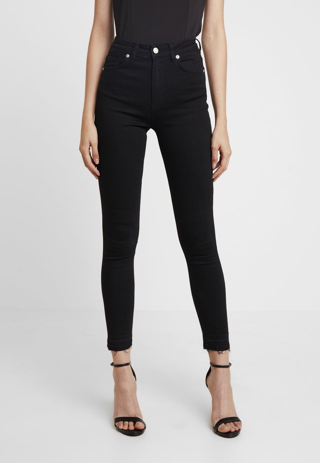 HIGH WAIST OPEN HEM - Jeans Skinny Fit - black