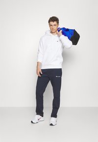 Champion CLASSIC STRAIGHT HEM PANTS - Treningo apatinė dalis - dark blue