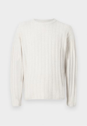 Cremefarvet sweater med ribbet tekstur, rund halsudskæring og lange ærmer. Blødt stof med en afslappet pasform.