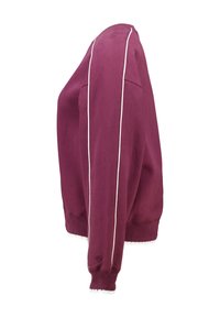 Tummanpunainen collegepaita valkoisilla saumoilla, resorilliset hihansuut ja helma, hieman väljää mallia, pehmeästä puuvillamateriaalista valmistettu. Siinä on teksturoitu pinta.