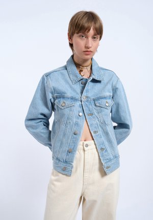 Light blue denim jacket with a collared neckline, front pockets, and silver buttons. Features a relaxed fit and slightly faded texture.