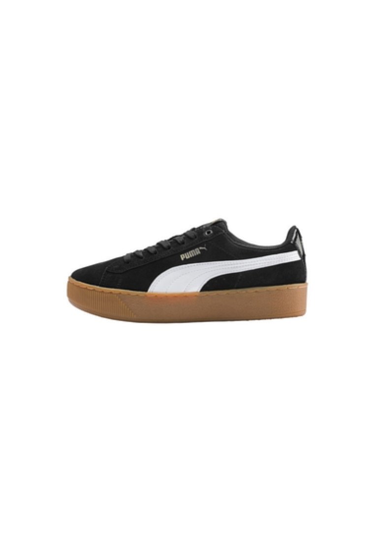 Zapatillas de ante negro con una franja lateral blanca, suela de goma, cordones planos y un diseño minimalista en el lateral y la lengüeta.