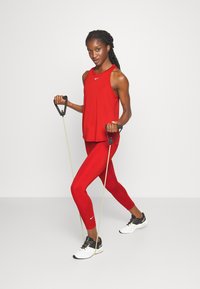 Nike Performance ONE - Leggings - rot/weiss