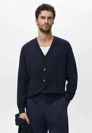 Navy blue cardigan made from knitted fabric, featuring a V-neck, long sleeves, and six buttons down the front. Textured finish, relaxed fit.