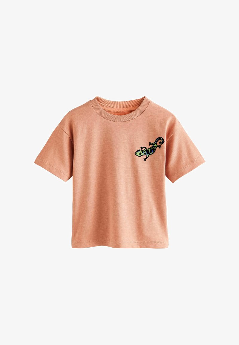 Rosa Baumwoll-T-Shirt mit kurzen Ärmeln und Rundhals. Verfügt über ein gesticktes Chamäleon-Design in Grün und Schwarz auf der linken Brust.