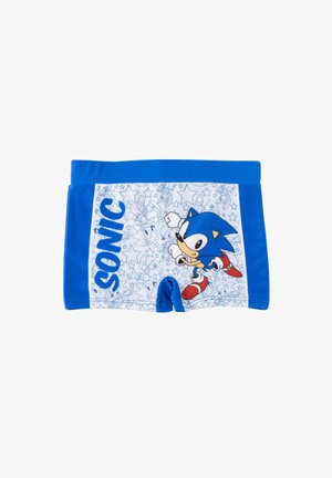 Blue and white boys' swim trunks featuring Sonic the Hedgehog running, with "SONIC" text and star and character line art background.