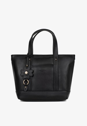 Sac fourre-tout en cuir noir avec doubles anses, poche plaquée frontale et charm décoratif en forme de fleur avec anneau et clous dorés.