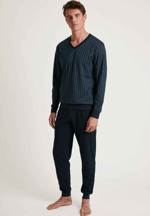 Marine lounge set met een gebloemd longsleeve V-hals top en bijpassende tapered broek, gemaakt van zachte stof met elastische manchetten.