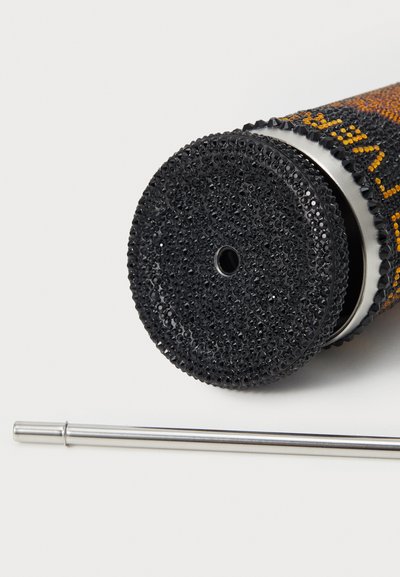 Black cylindrical roller with a textured surface, featuring a silver metal section and a detachable metal rod alongside.