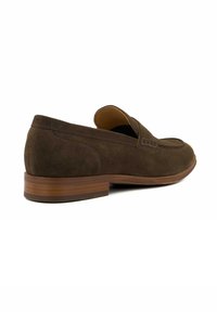 Dark brown suede loafers with a low heel, featuring a stitched design and a rounded toe. Smooth texture and minimalist style.