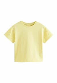 Kortærmet yellow t-shirt, blød tekstur, rund hals, med broderede blomsterdetaljer på begge skuldre. Løs pasform.