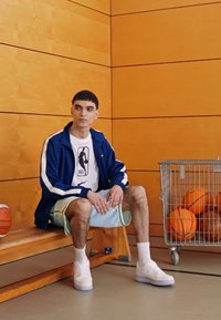 Nike Performance DNA SHORT - Sports shorts - glacier blue/barely volt/bright mandarin