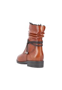 Braune Leder-Stiefelette mit lässigem Design, Schnürdetails und einer leichten Gummisohle. Verfügt über einen strukturierten oberen Rand und ein Logo-Detail.