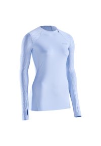 Haut de sport à manches longues bleu clair avec motif en losanges sur les manches, ouvertures pour les pouces, et petite fermeture éclair au niveau de l'encolure.